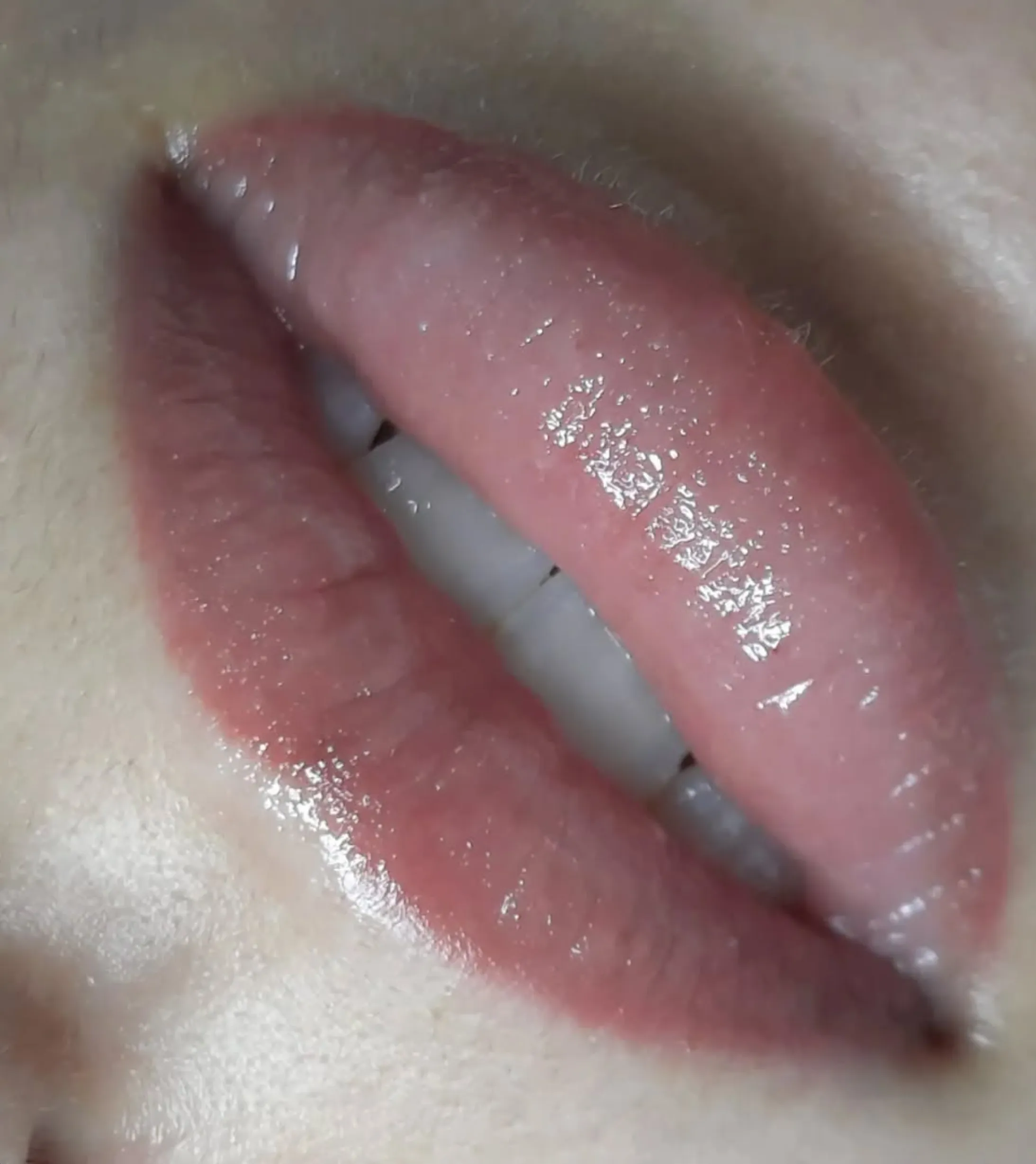 Drinking coffee Before a Lip Tattoo